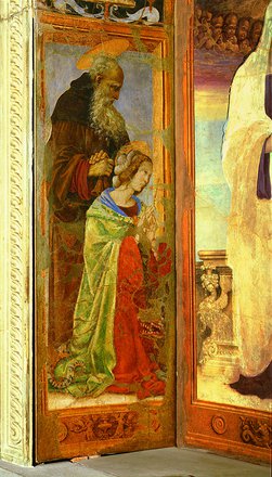 I Santi Margherita e Antonio Abate riuniti in preghiera adorano la Madonna col Bambino posta al centro del tabernacolo